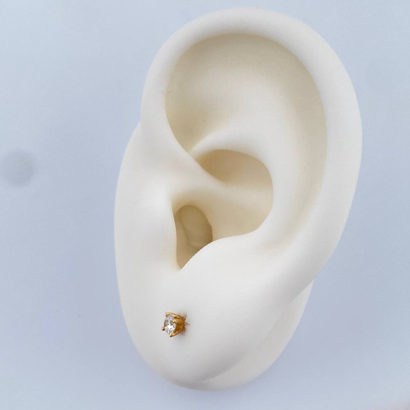 Topos Cuatro Garras Diamante 1.15gr / Oro Amarillo 18K %