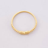 Anillo Corazón Moño 0.9g / T5 3/4 Oro Amarillo 18K