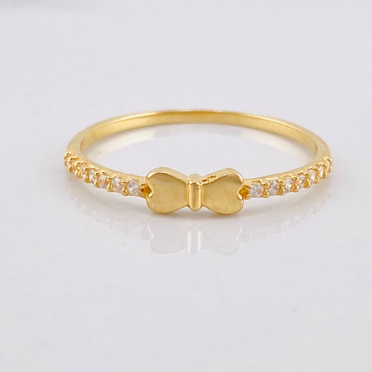 Anillo Corazón Moño 0.9g / T5 3/4 Oro Amarillo 18K