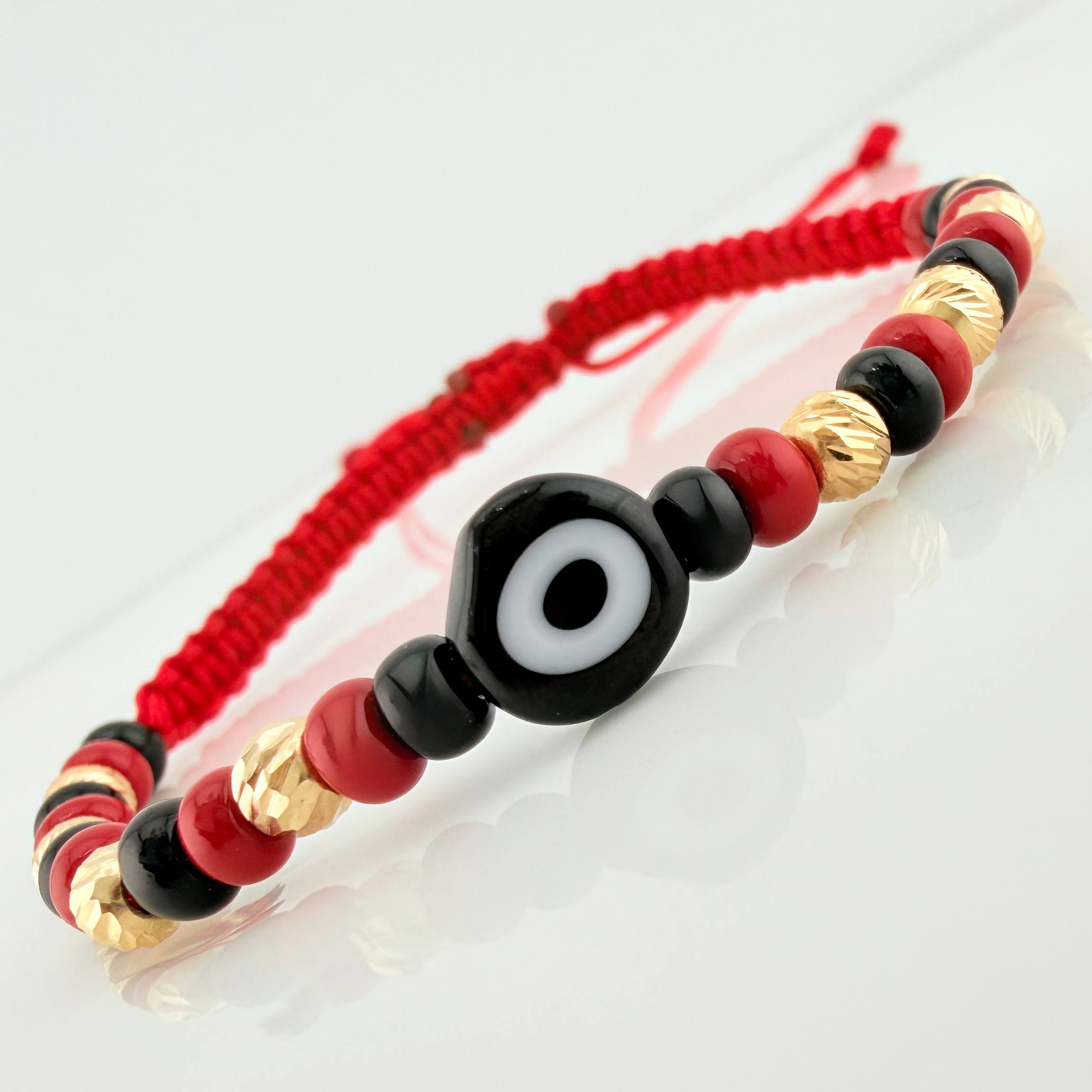 Pulsera Tejida Roja Ojo Turco Oro Amarillo 18K