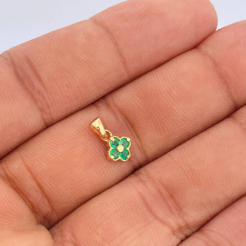 Dije Flor  0.7gr / 1.2cm / Oro Amarillo 18K &