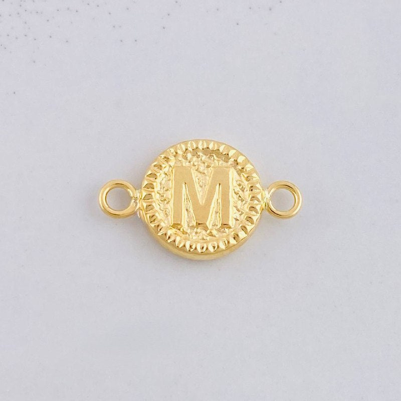 Herraje Circulo Letra M 0.55g / 1.7cm Oro Amarillo 18K