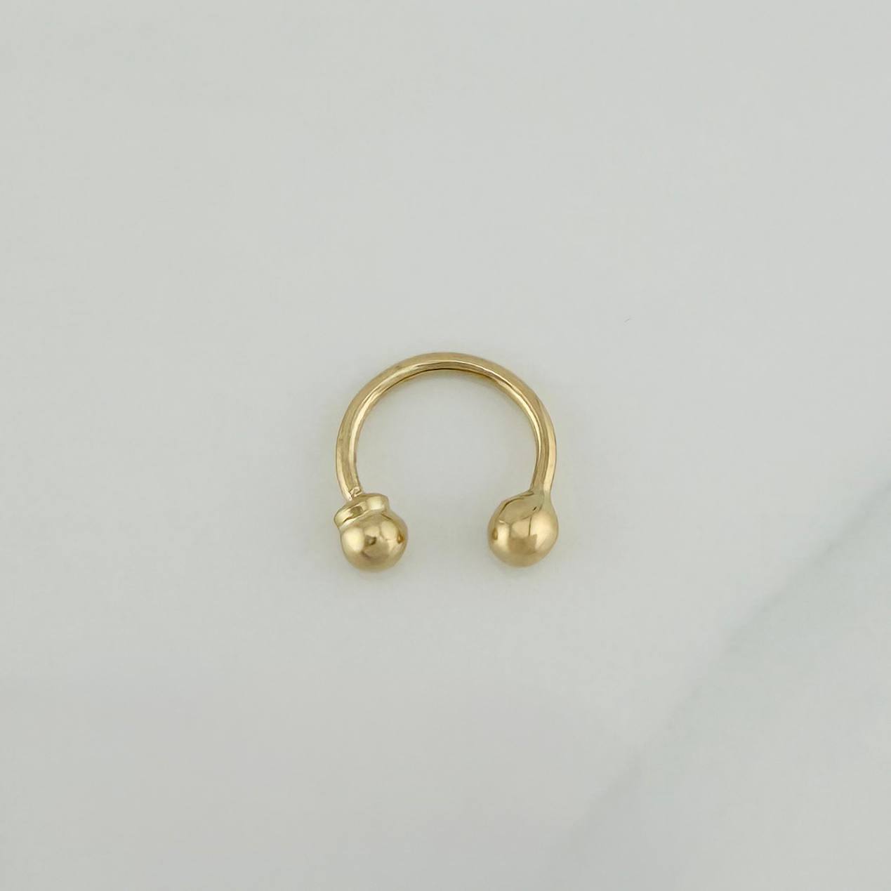 Piercing Curvo Bola 0.4 g / 1 cm Oro Amarillo 18K