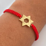 Pulsera Tejida Roja Estrella David 1.1gr / Oro Amarillo 18K $