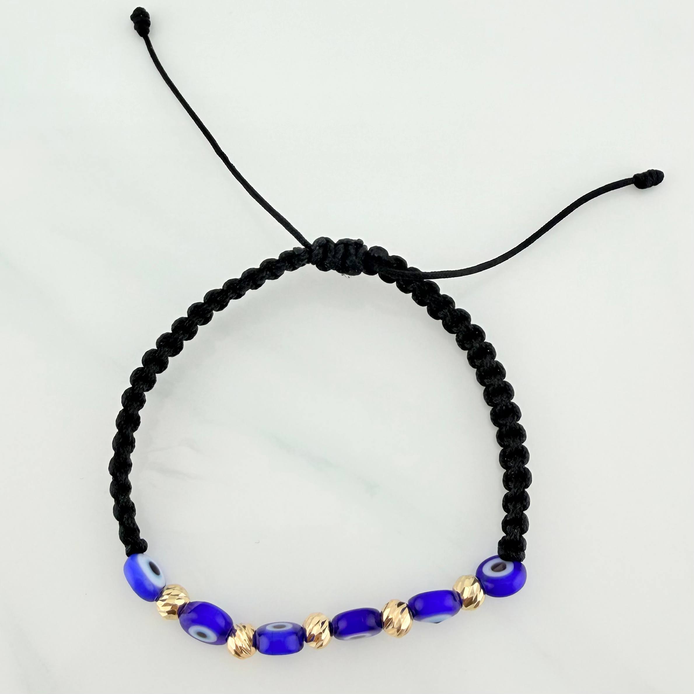 Pulsera Tejida Negra Ojos Turcos Azules Oro Amarillo 18K