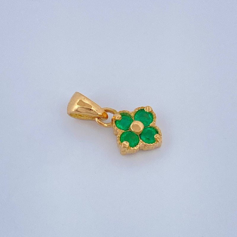 Dije Flor  0.7gr / 1.2cm / Oro Amarillo 18K &