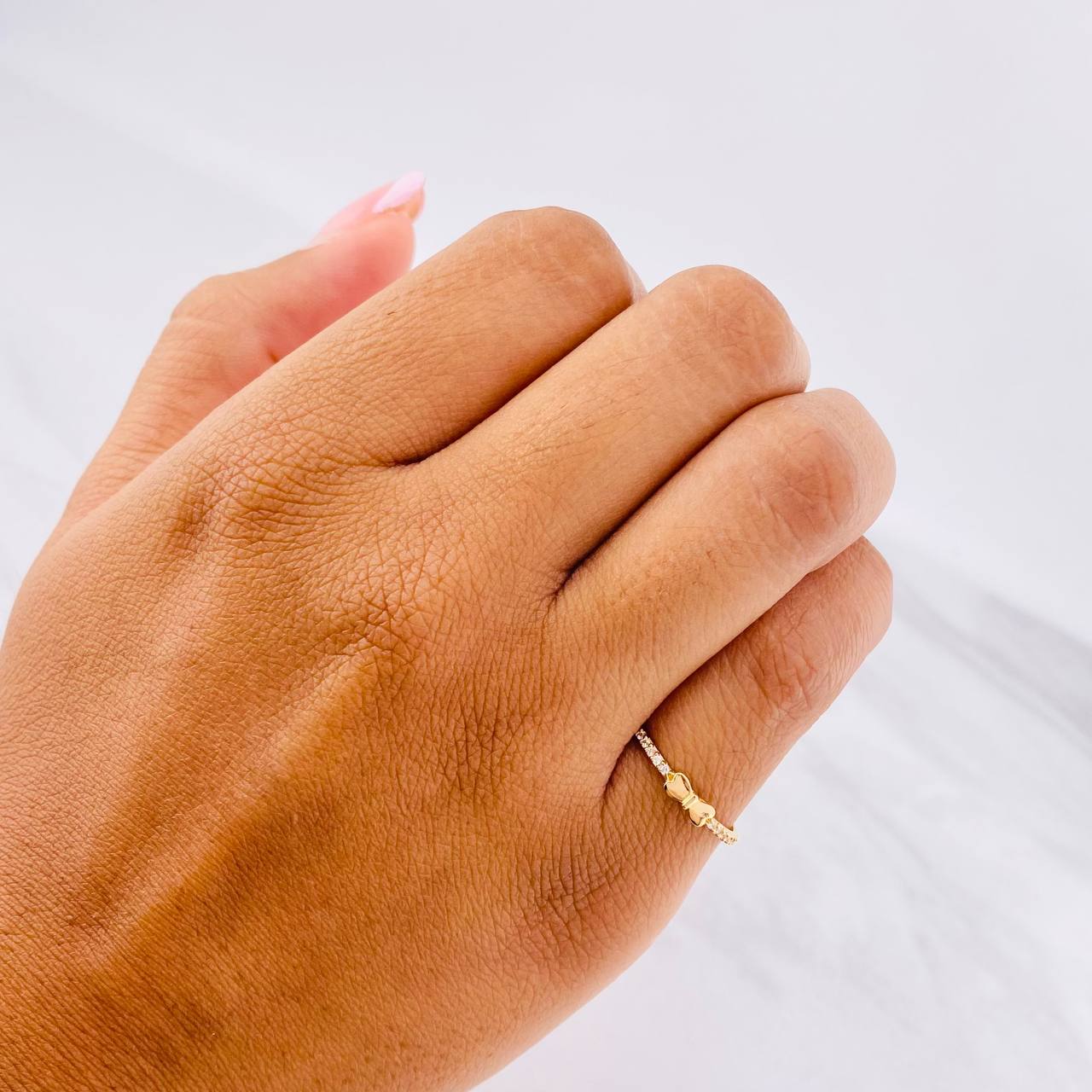 Anillo Corazón Moño 0.9g / T5 3/4 Oro Amarillo 18K