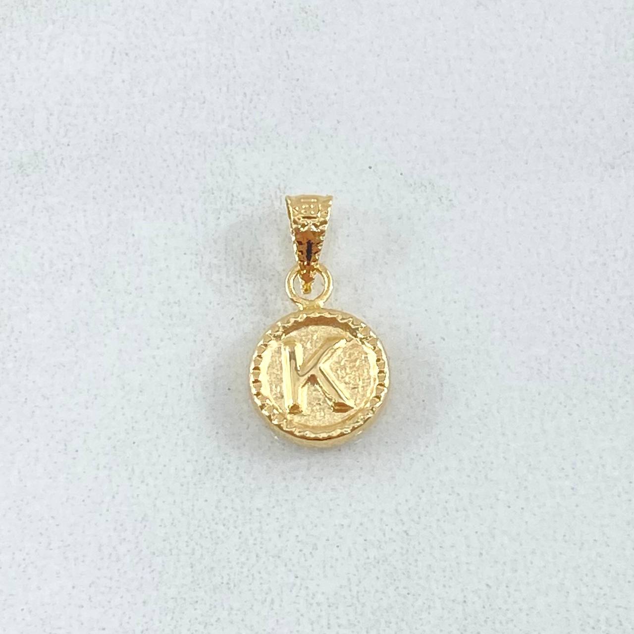 Dije Letra K 0.45gr / 1.4cm / Circulo Cargador Bordeado Oro Amarillo 18K *