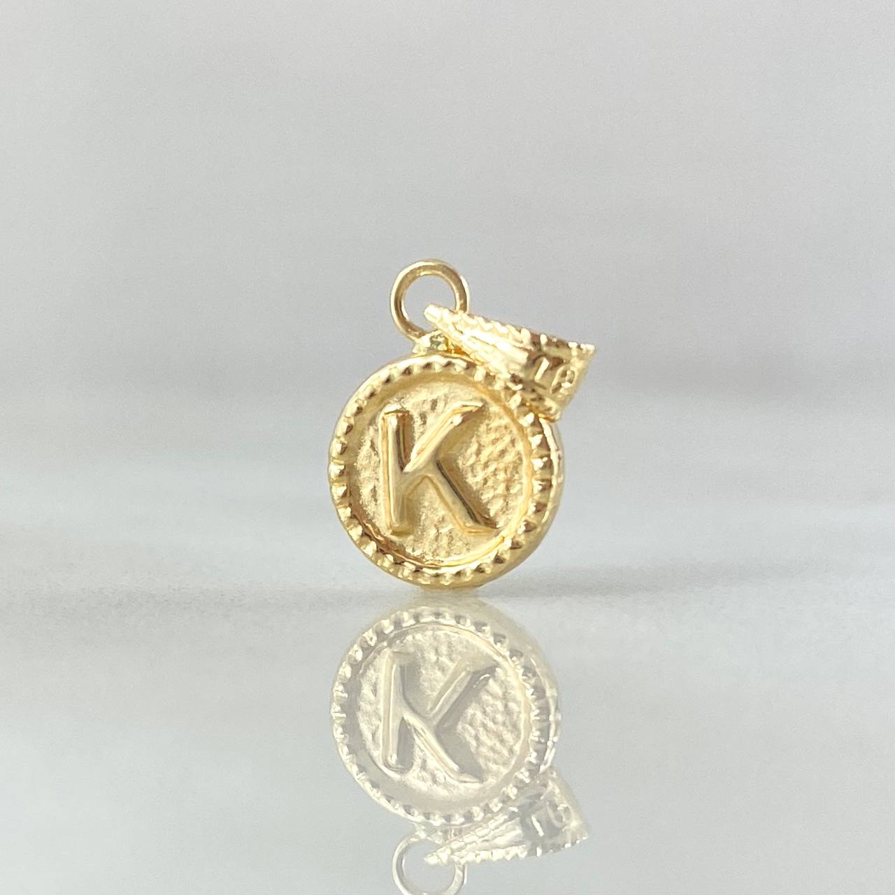Dije Letra K 0.45gr / 1.4cm / Circulo Cargador Bordeado Oro Amarillo 18K
