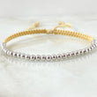 Pulsera Beige Bolas Lisas 1.5gr / Oro Blanco 18K *