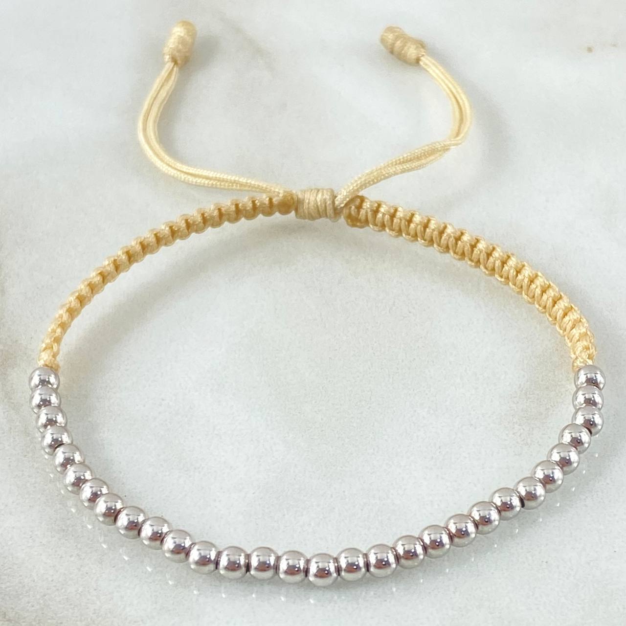 Pulsera Beige Bolas Lisas 1.5gr / Oro Blanco 18K *