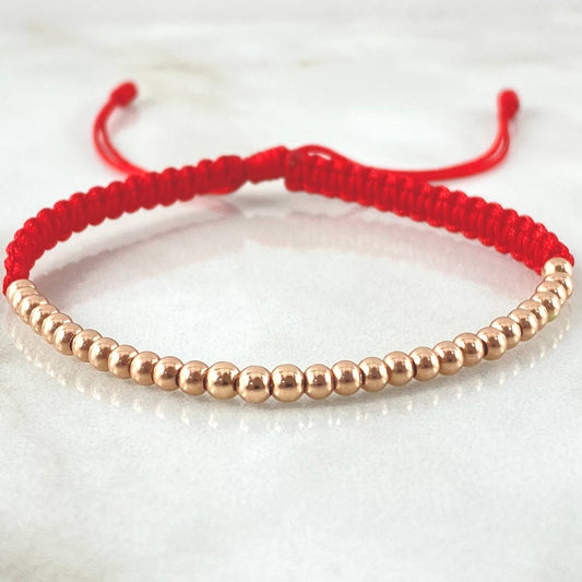 Pulsera Roja Bolas Lisas 1.5gr / Oro Rosa 18K *
