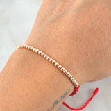 Pulsera Roja Bolas Lisas 1.5gr / Oro Rosa 18K *