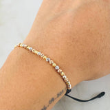 Pulsera Negra Bolas Diamantadas 1.8gr / Tres Oros 18K *