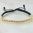 Pulsera Negra Bolas Lisas 1.5gr / Oro Amarillo 18K *