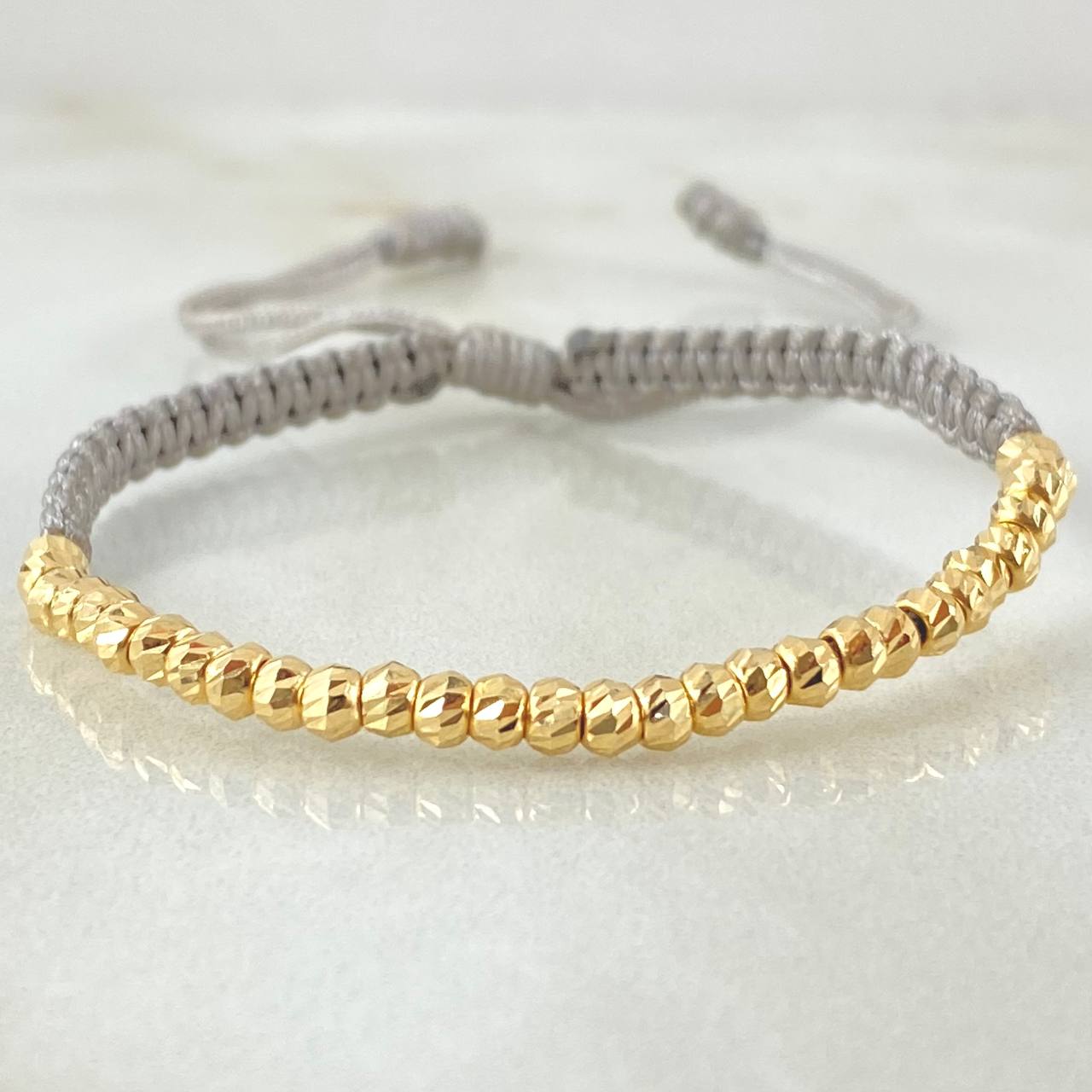 Pulsera Gris Bolas Diamantadas 1.8gr / Oro Amarillo 18K *