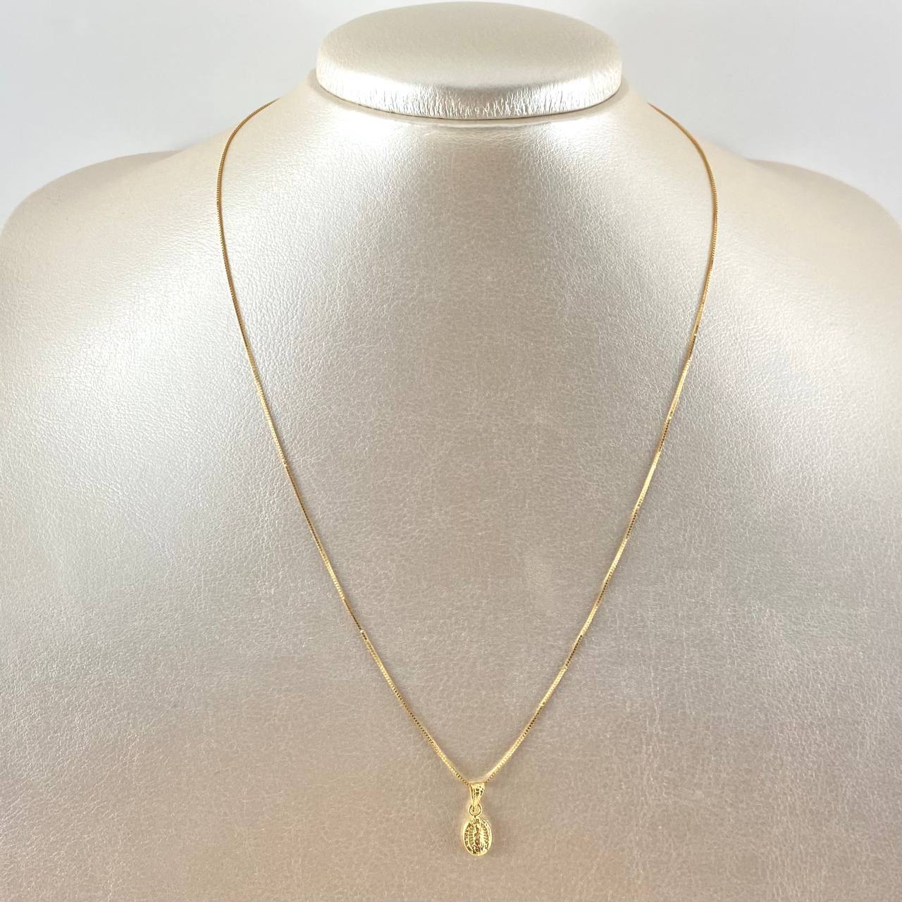 Set Cadena Veneciana 0.85gr / 40cm / 0.5mm + Dije Guadalupe Ovalado 0.35gr / 1.5cm Cargador Bordeado 1.2gr Oro Amarillo 18K (Oferta) *