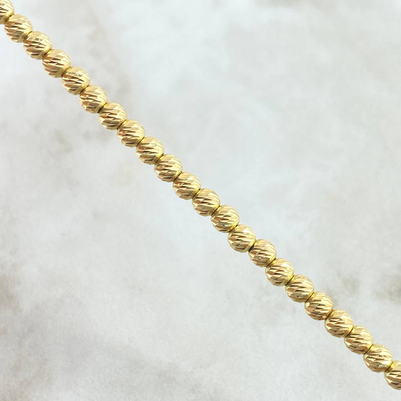 Pulso Militar 4.65gr / 19cm / 4mm Bolas Diamantadas Oro Amarillo 18K