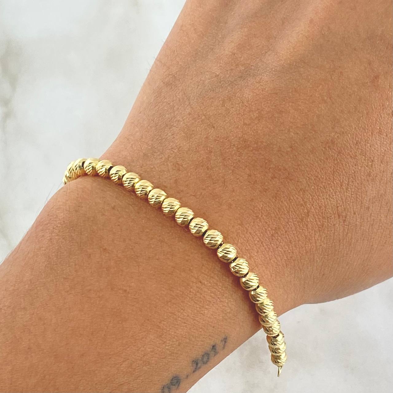 Pulso Militar 4.65gr / 19cm / 4mm Bolas Diamantadas Oro Amarillo 18K
