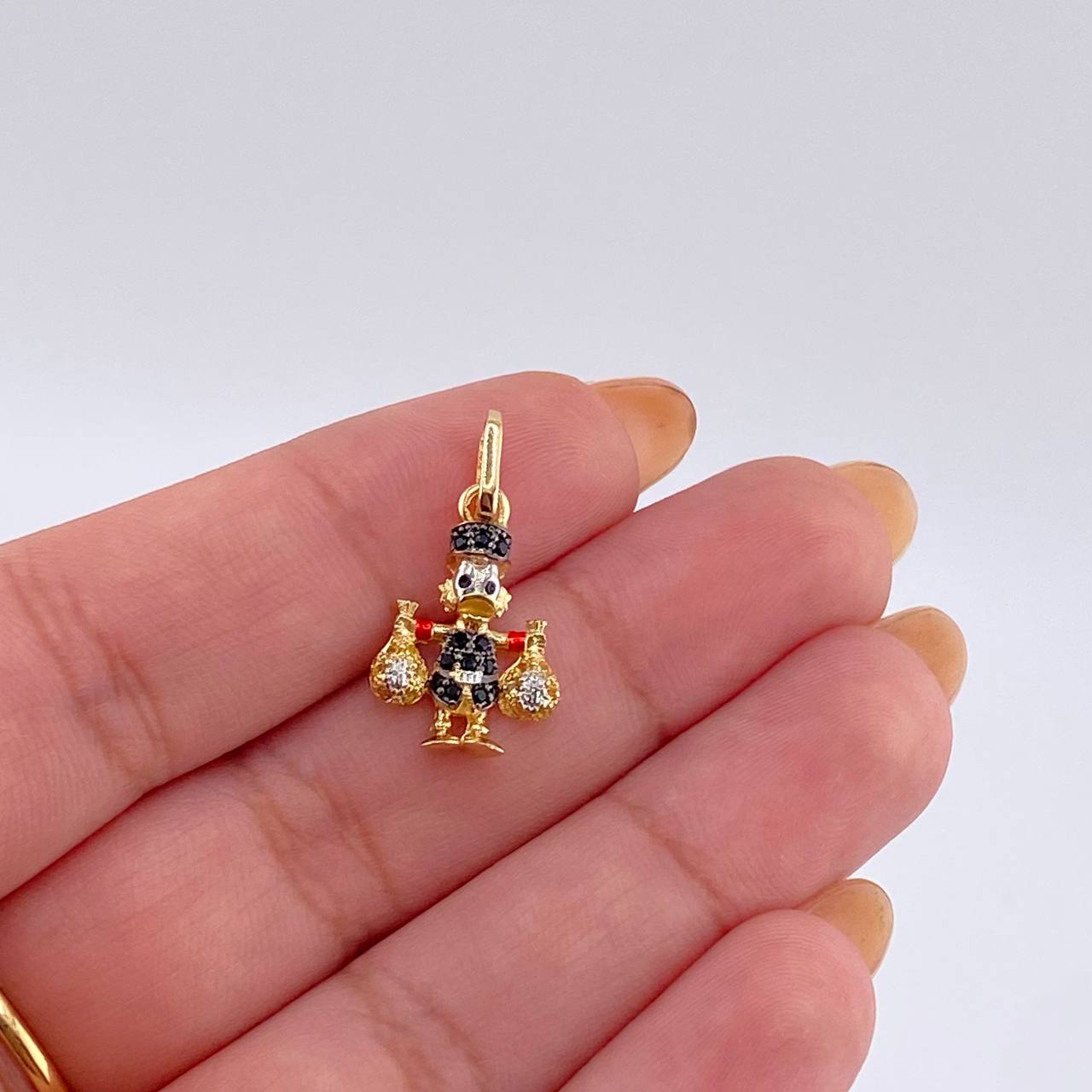 Dije Pato Bolsa Dinero 1.45gr / 2.2cm / Oro Amarillo 18K