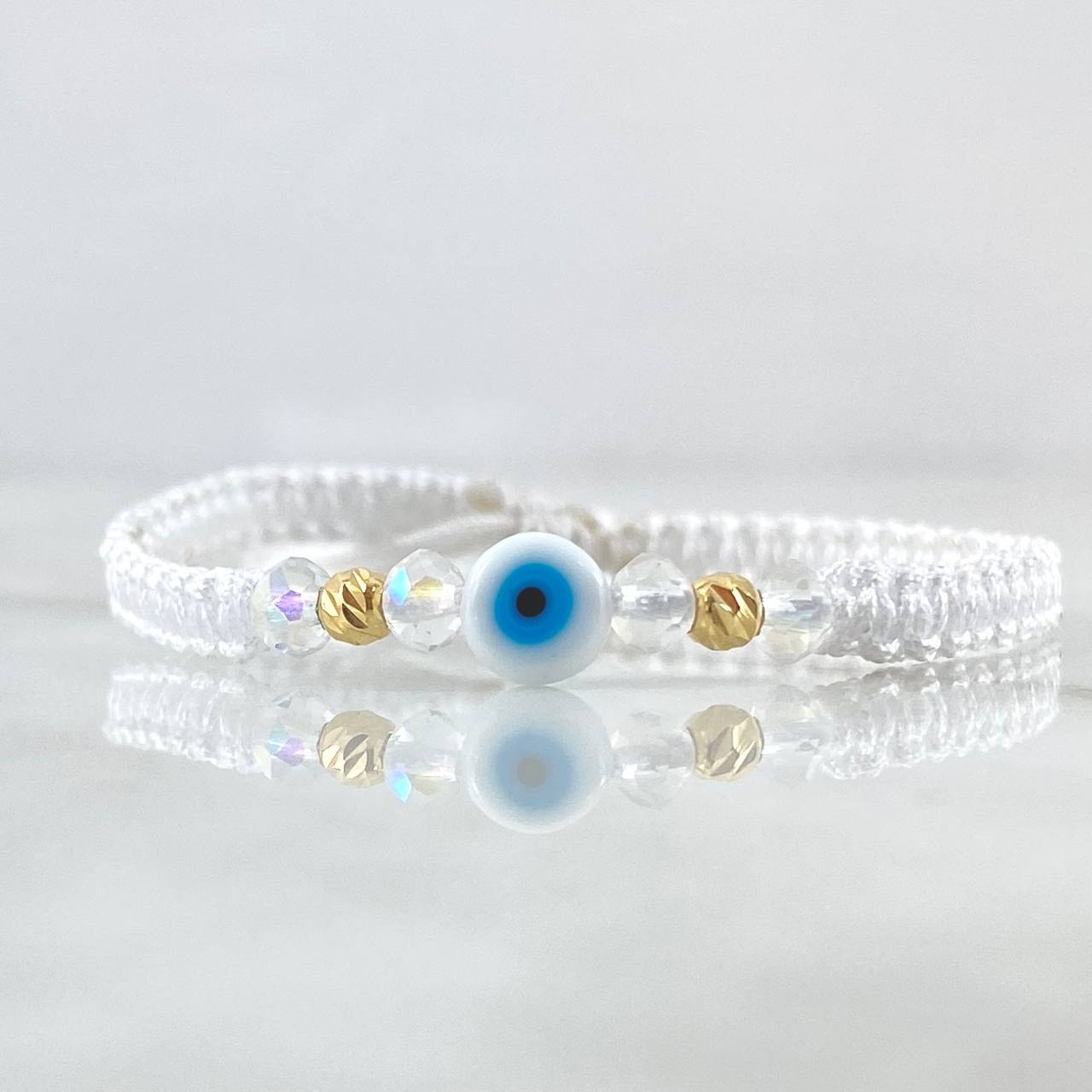 Pulsera Blanca Ojo Turco 4mm Bolas Diamantadas 2 Und Oro Amarillo 18K (A.C)