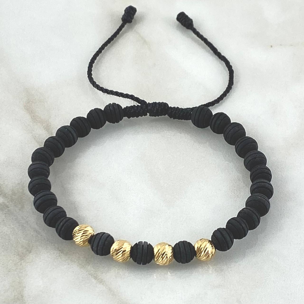Pulsera Negra Bolas Diamantadas 1.2gr / 6mm 4 Und Oro Amarillo 18K (A.C)