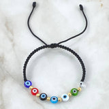 Pulsera Negra Ojo Turco 0.4gr / 3mm Bolas Diamantadas 6 Und Oro Amarillo 18K (A.C)