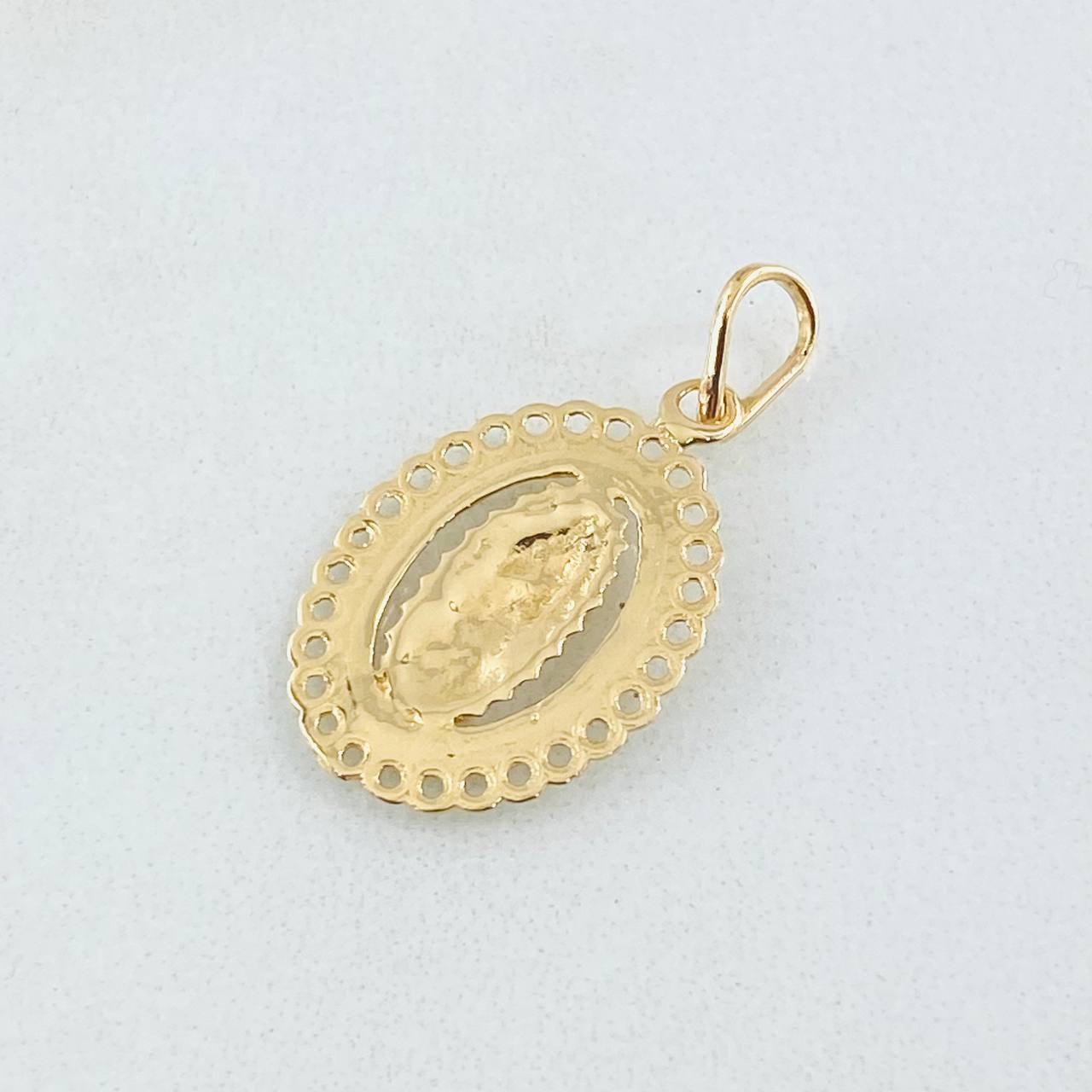 Dije Virgen de Guadalupe 1.05gr / 2.3cm / Oro Amarillo 18K ©
