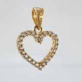 Dije Silueta Corazón Doble Faz 1.4gr / 1.8cm / Oro Amarillo 18K ©