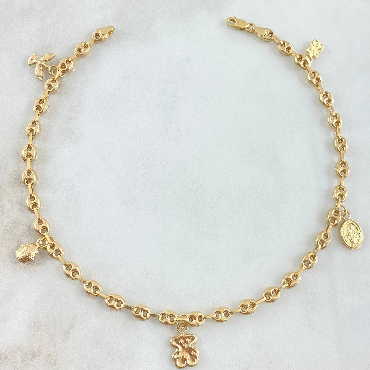 Tobillera GC Calabrote 4.9gr / 24cm / Oso TS-Avion-Mariquita-Virgen Milagrosa Oro Amarillo 18K