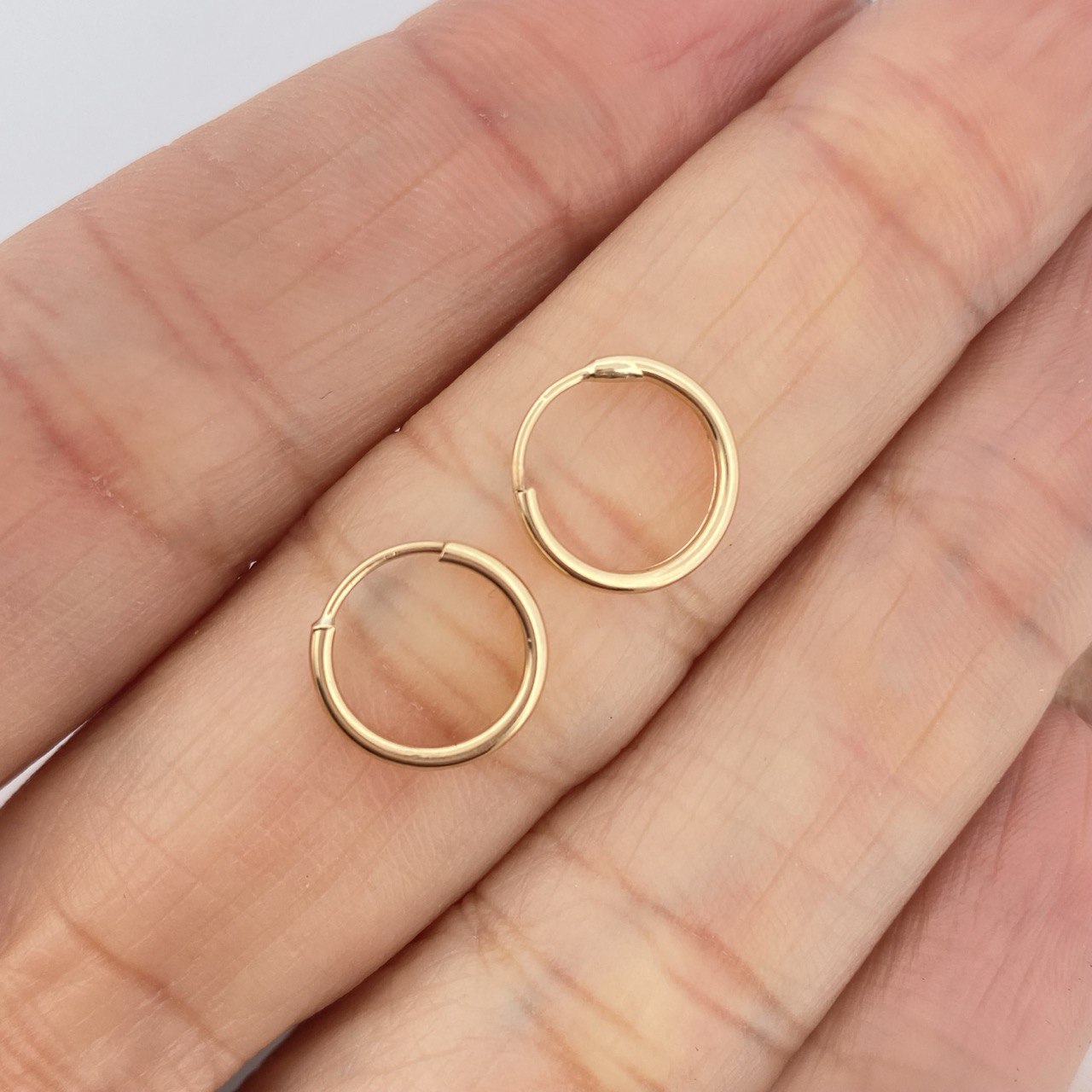 Candongas Mini Aro 0.55gr / 1cm / Oro Amarillo 18K &