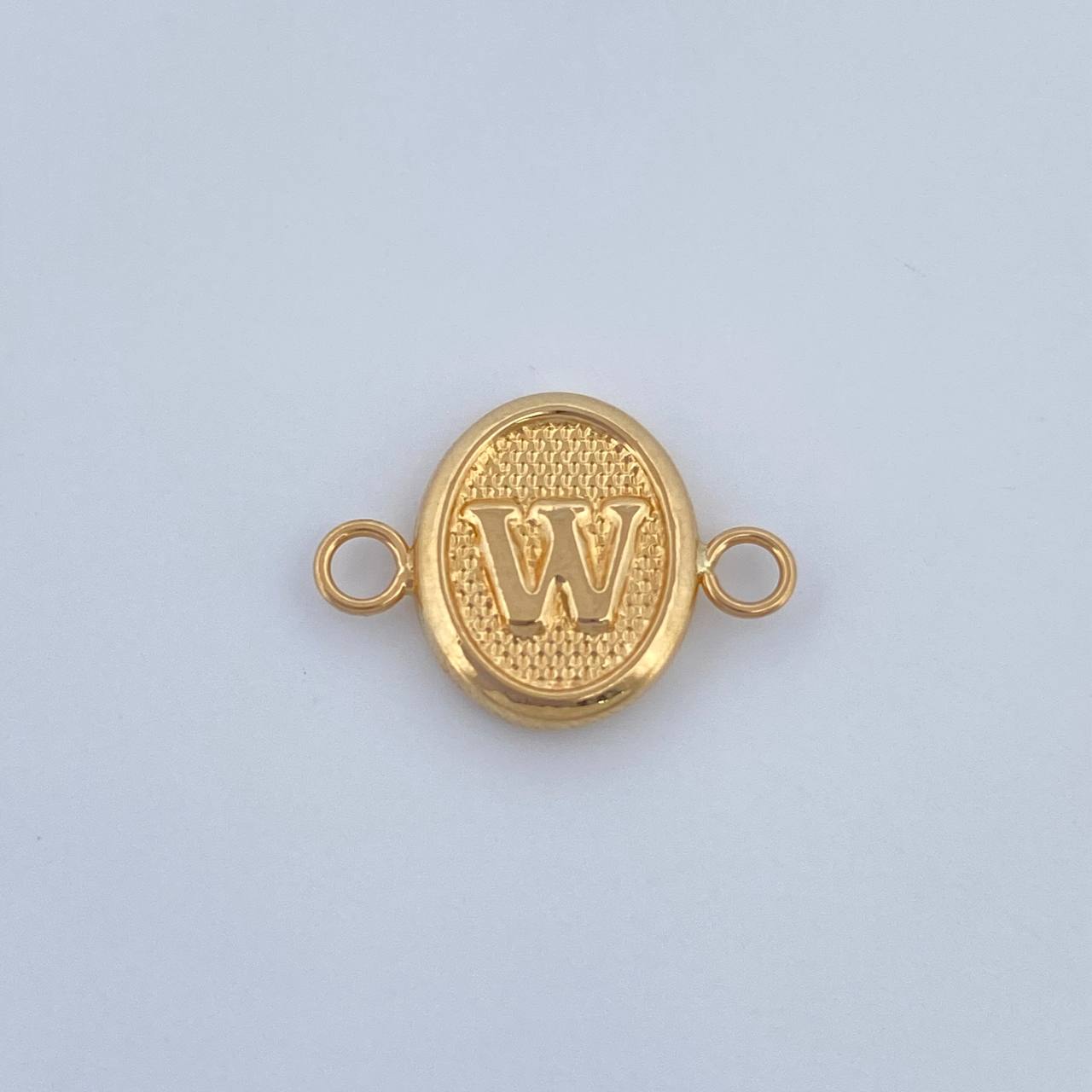 Herraje Letra W 0.4gr / 1.5cm / Oro Amarillo 18K &