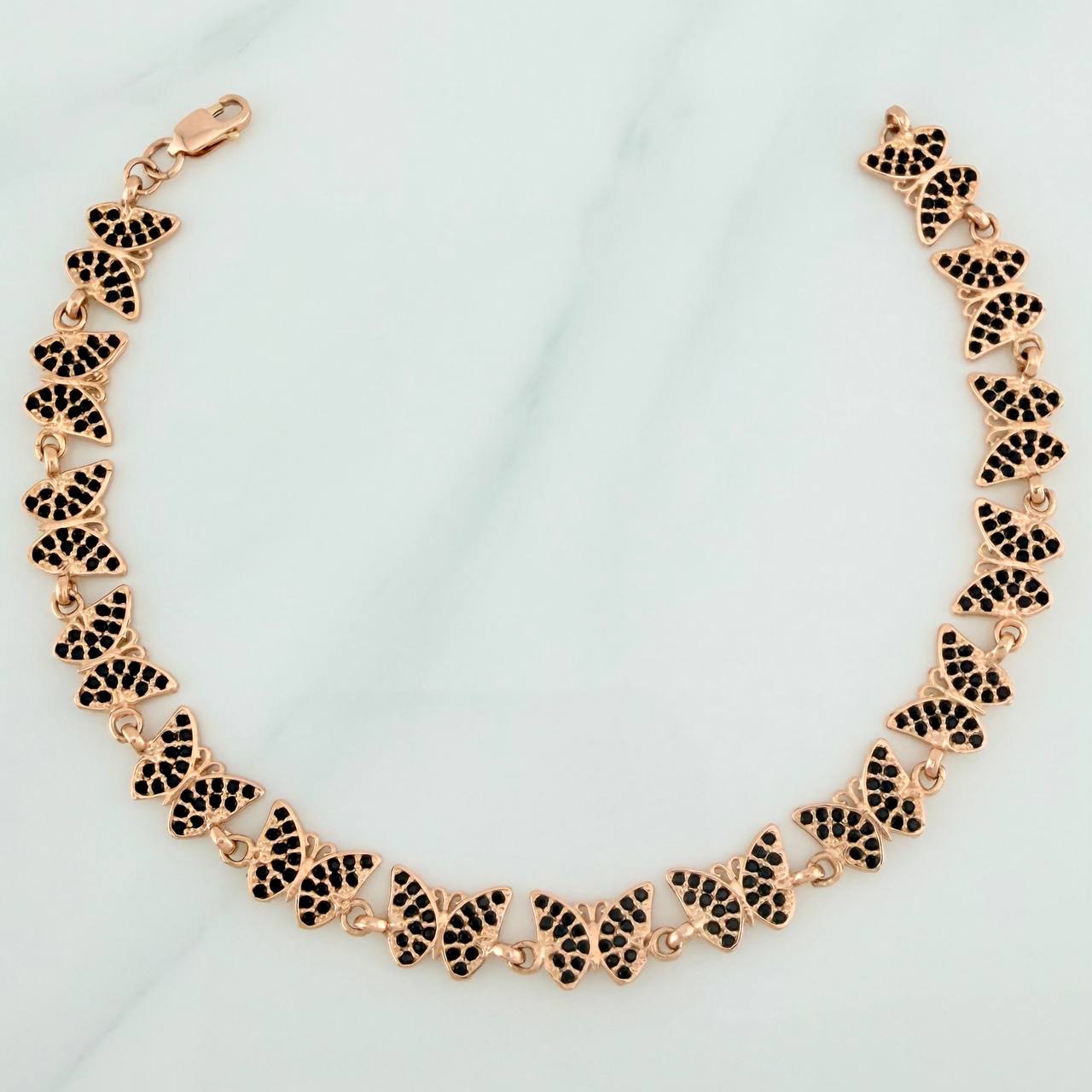 Pulso Mariposas 10.25gr / 7.3cm / Oro Rosa 18K $