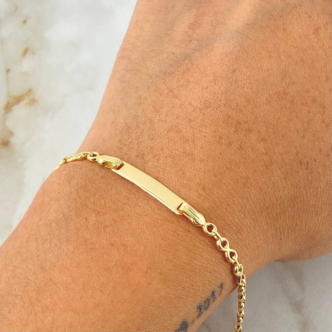 Pulso Bebé Infinito Placa Rectangular 1.85gr / 14cm / Oro Amarillo 18K *