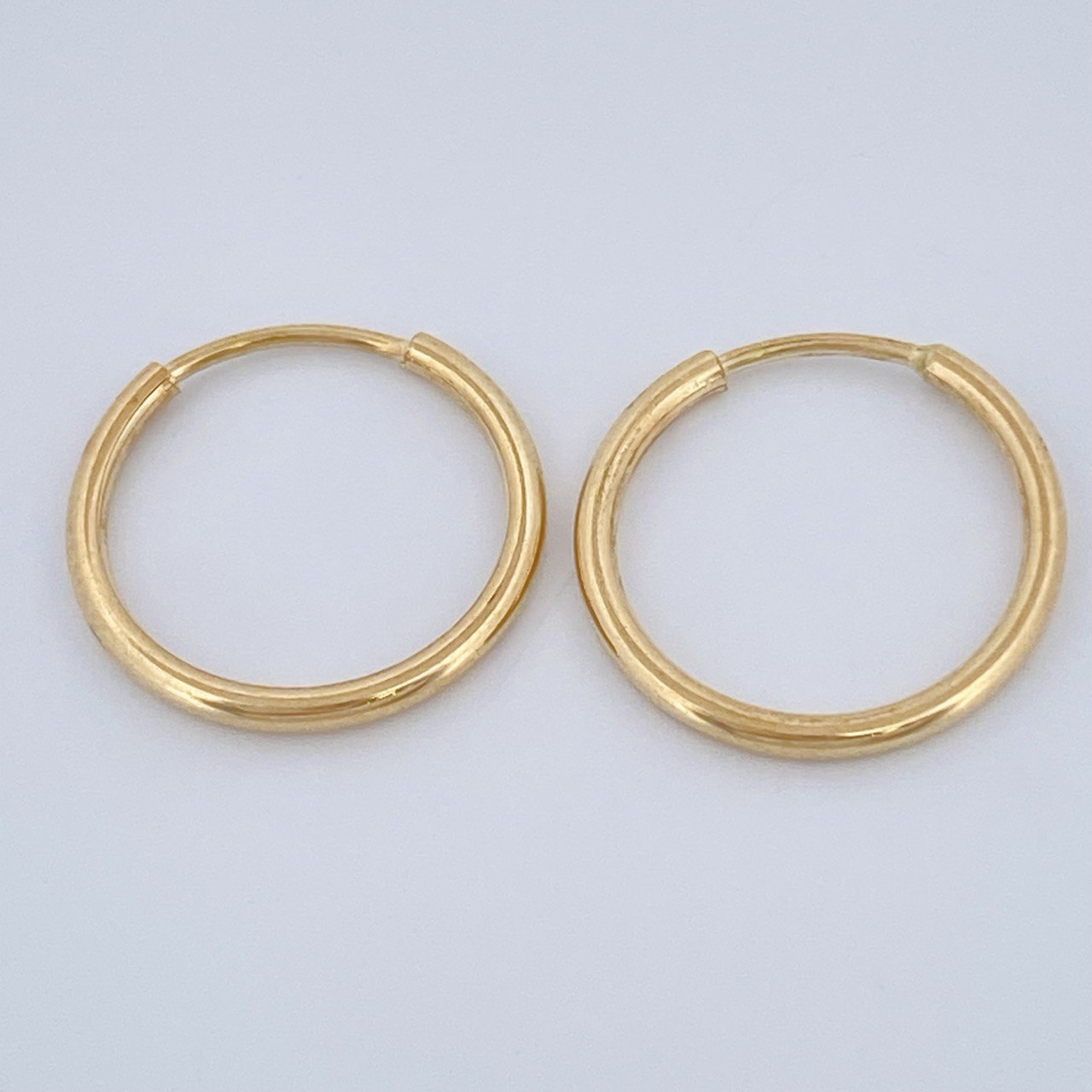 Candongas Mini Aro 0.6gr / 1.2cm / Oro Amarillo 18K &