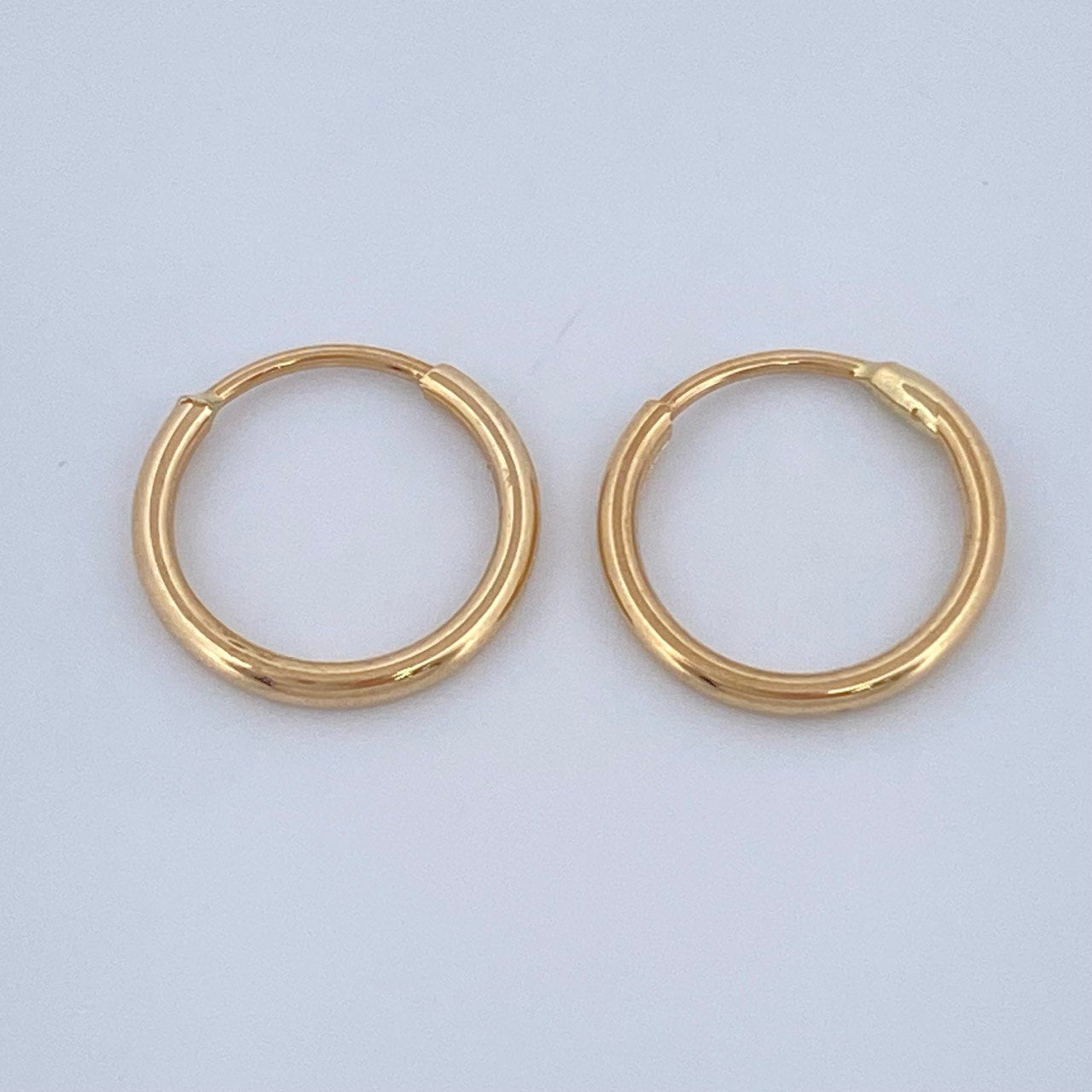 Candongas Mini Aro 0.55gr / 1cm / Oro Amarillo 18K &
