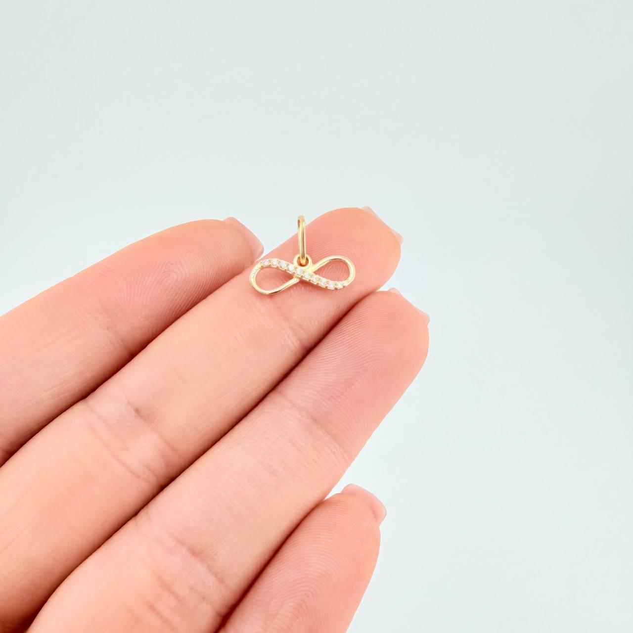 Dije Infinito 0.5 g / 1 cm Oro Amarillo 18K
