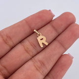 Dije Letra R 0.5gr / 1.4cm / Liso Oro Amarillo 18K $