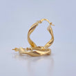 Candongas Bella 2.5gr / 2.5cm / Entorchadas Oro Amarillo 18K $