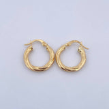 Candongas Kira 2.25gr / 2.1cm / Torcidas Oro Amarillo 18K $