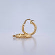 Candongas Kira 2.25gr / 2.1cm / Torcidas Oro Amarillo 18K $