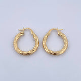 Candongas Mafe 2.35gr / 2.3cm / Entorchadas Oro Amarillo 18K $