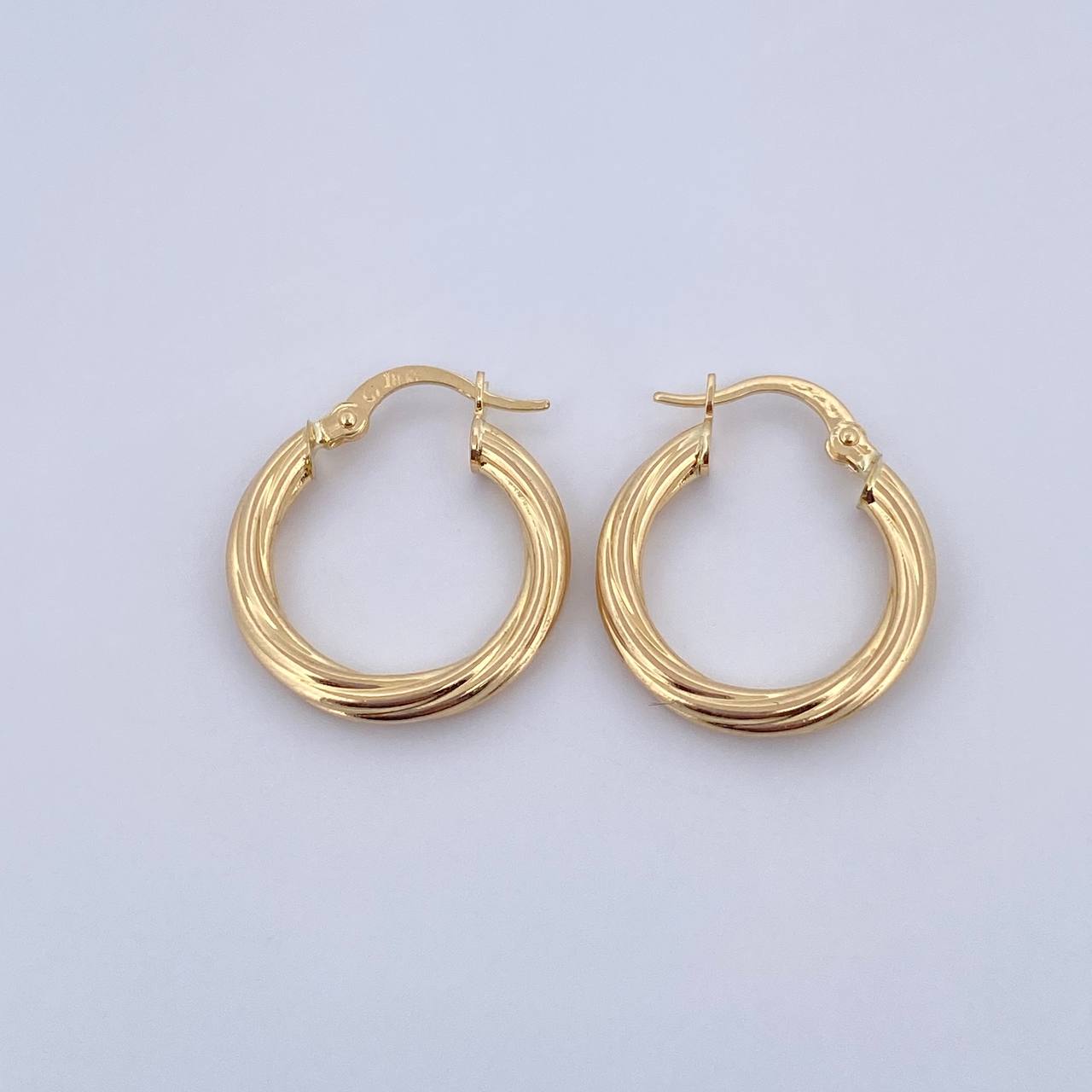 Candongas Mary 2.2gr / 2.2cm / Entorchadas Oro Amarillo 18K $