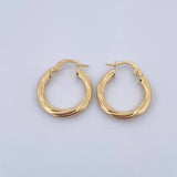 Candongas Mary 2.2gr / 2.2cm / Entorchadas Oro Amarillo 18K $