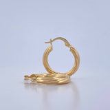 Candongas Mary 2.2gr / 2.2cm / Entorchadas Oro Amarillo 18K $