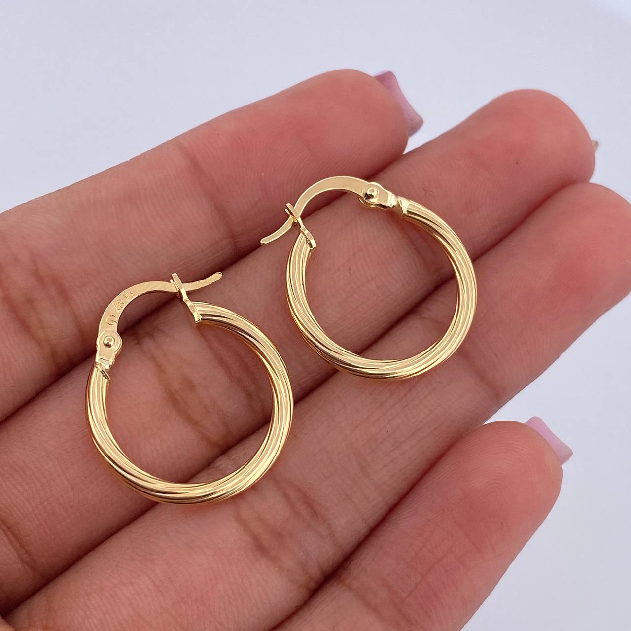 Candongas Lore 1.4gr / 2cm / Entorchadas Oro Amarillo 18K $