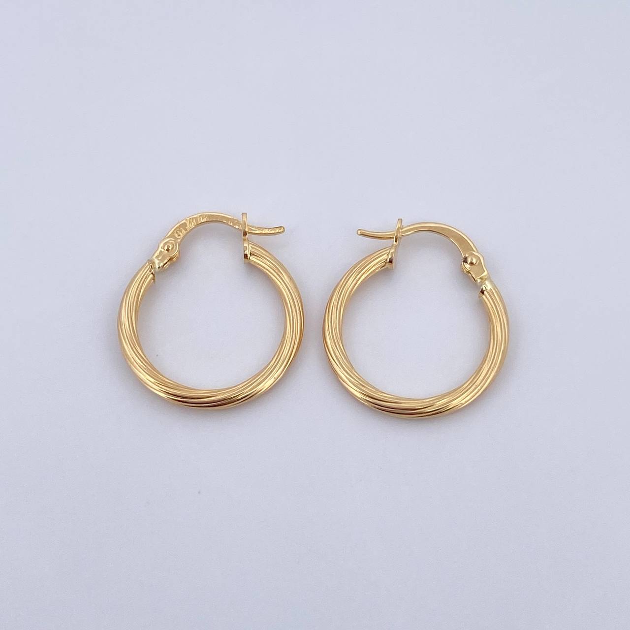 Candongas Lore 1.4gr / 2cm / Entorchadas Oro Amarillo 18K $