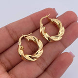 Candongas Cece 3.45gr / 2.2cm / Entorchadas Oro Amarillo 18K $