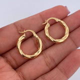 Candongas Cora 2.25gr / 2cm / Rayadas Entorchadas Oro Amarillo 18K $