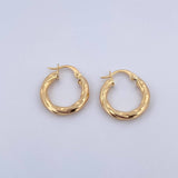 Candongas Cora 2.25gr / 2cm / Rayadas Entorchadas Oro Amarillo 18K $
